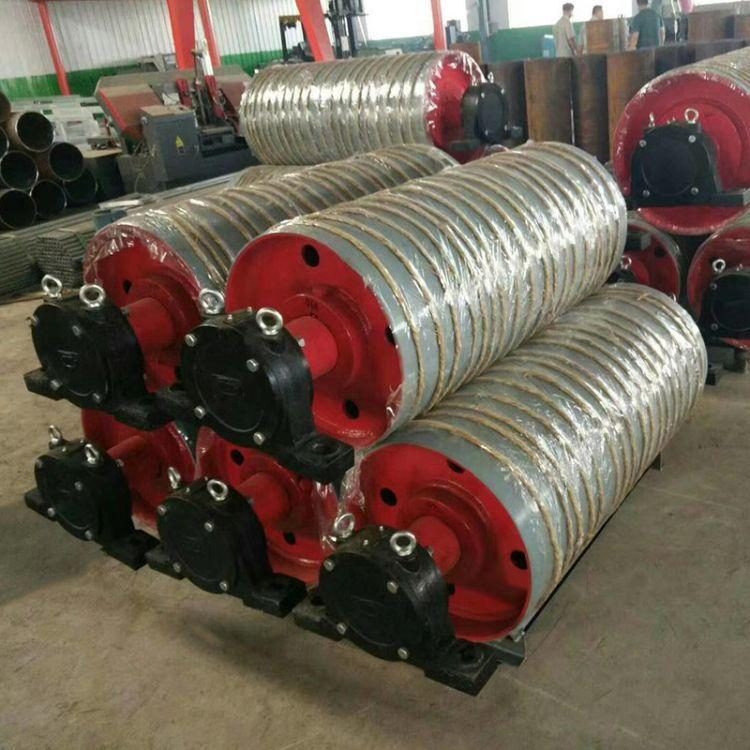 Conveyor drive pulleys and rollers